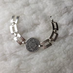 Silver embellished link bracelet with large charm